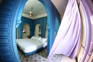 Postel nebo postele na pokoji v ubytování Layali Al Shams Hotel