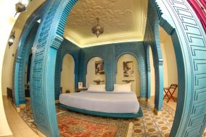Postel nebo postele na pokoji v ubytování Layali Al Shams Hotel