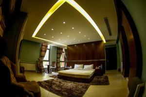 Postel nebo postele na pokoji v ubytování Layali Al Shams Hotel
