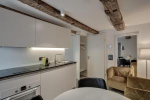 Kuchyň nebo kuchyňský kout v ubytování smartroom The Residence la Cittadella Baden + 11 fotografií