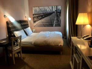 Postel nebo postele na pokoji v ubytování Hotel Vanilla