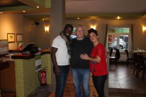 a group of three people posing for a picture at B&B De Vroling in Wellen
