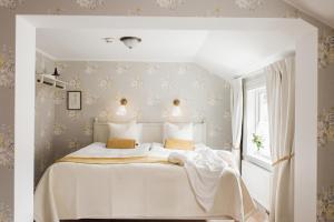 En eller flere senger på et rom på Hilma Winblads Bed & Breakfast