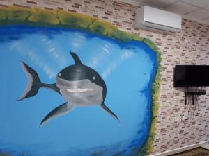 TV a/nebo společenská místnost v ubytování Hotel Rothschild 37