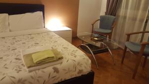 Postel nebo postele na pokoji v ubytování B&B in Arena L' Opera