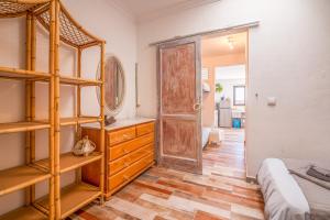 Łóżko lub łóżka w pokoju w obiekcie Los Ancones Apartment