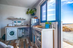 Kuchnia lub aneks kuchenny w obiekcie Los Ancones Apartment