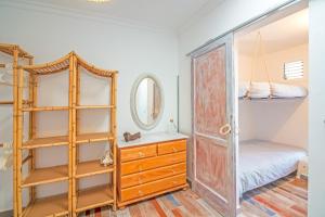 Łóżko lub łóżka w pokoju w obiekcie Los Ancones Apartment