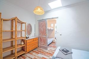 Łóżko lub łóżka w pokoju w obiekcie Los Ancones Apartment