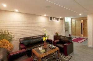 Posezení v ubytování Aparthotel Les Oliviers Suites & Spa
