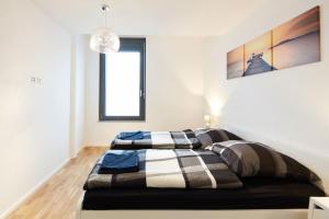 Voodi või voodid majutusasutuse City Apartment Stuttgart toas