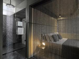 Posteľ alebo postele v izbe v ubytovaní Athens Avaton Suites