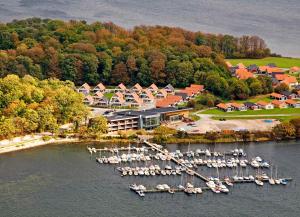 an aerial view of a marina with boats in the water at Enjoy Resorts Marina Fiskenæs in Gråsten