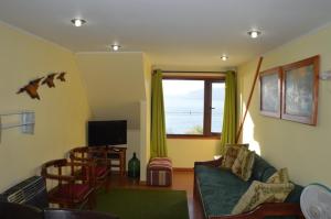 TV a/nebo společenská místnost v ubytování Los Gualles de la Candelaria Apart Hotel