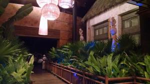a room with a bunch of plants and lights at Suites at Mayan Palace Vidanta Resort Riviera Maya in Playa del Carmen