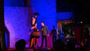 a man and a woman standing on a stage at Suites at Mayan Palace Vidanta Resort Riviera Maya in Playa del Carmen