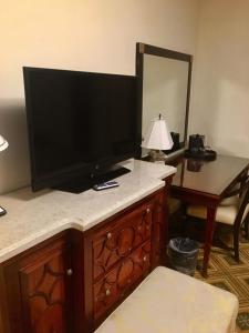 A television and/or entertainment center at Embassy Hotel