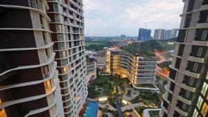 an aerial view of a city with tall buildings at Afiniti Muslim Medini Condo in Nusajaya