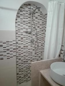 Ett badrum på Trulli Resort Grassi