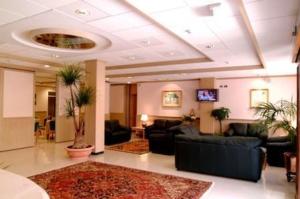 TV a/nebo společenská místnost v ubytování Park Hotel La Grave
