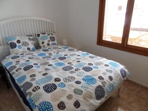 Un ou plusieurs lits dans un hébergement de l'établissement Appartement Sant Elmo, Cala Conills, WIFI