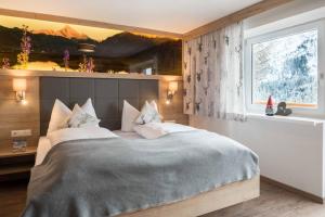 Posteľ alebo postele v izbe v ubytovaní Bergspitz Luxury Appartement