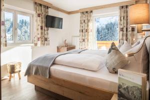 Posteľ alebo postele v izbe v ubytovaní Bergspitz Luxury Appartement