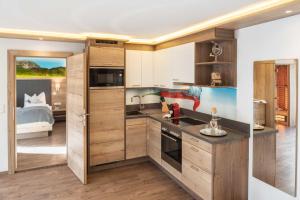 Kuchyňa alebo kuchynka v ubytovaní Bergspitz Luxury Appartement