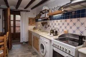Una cocina o zona de cocina en L'Arc de Pedra