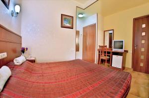 Voodi või voodid majutusasutuse Hostel JUPITER toas