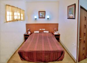 Voodi või voodid majutusasutuse Hostel JUPITER toas