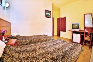 Voodi või voodid majutusasutuse Hostel JUPITER toas