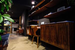 Sjónvarps- og/eða afþreyingartæki á GuestHouse Hostel MangeTak ゲストハウス マングタック広島
