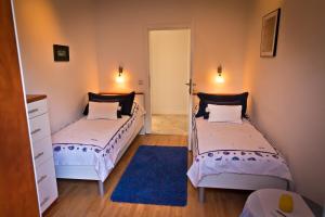 Säng eller sängar i ett rum på Delux Villa Hedonica