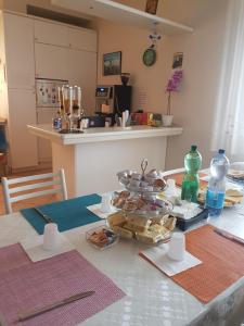 Kuchyň nebo kuchyňský kout v ubytování B&B Domus Benedicta