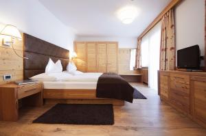 Ένα ή περισσότερα κρεβάτια σε δωμάτιο στο Mountain B&B - La Scalira