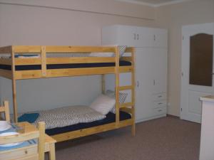 Postel nebo postele na pokoji v ubytování Apartmán pod Klínovcem
