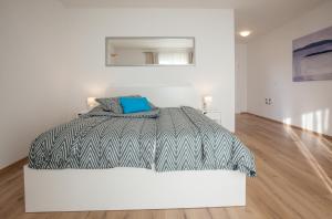 Postel nebo postele na pokoji v ubytování Apartment Penthouse Mak