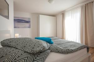 Postel nebo postele na pokoji v ubytování Apartment Penthouse Mak