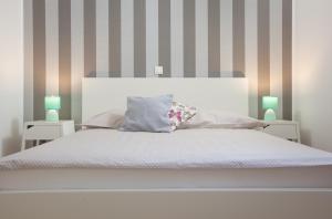 Postel nebo postele na pokoji v ubytování Apartment Penthouse Mak