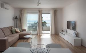 Posezení v ubytování Apartment Penthouse Mak