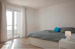 Postel nebo postele na pokoji v ubytování Apartment Penthouse Mak
