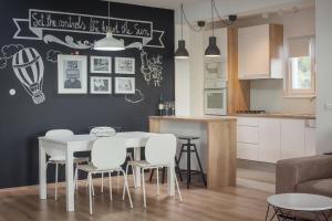 Kuchyň nebo kuchyňský kout v ubytování Apartment Penthouse Mak
