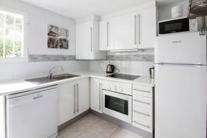 Kuchyň nebo kuchyňský kout v ubytování Casa Oasis