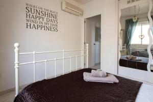 Postel nebo postele na pokoji v ubytování Casa Oasis