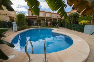 Bazén v ubytování Casa Oasis nebo v jeho okolí