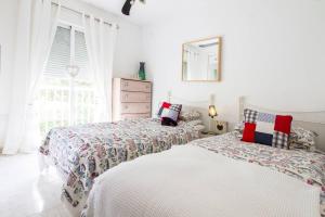 Postel nebo postele na pokoji v ubytování Casa Oasis