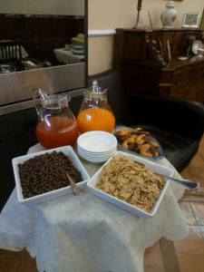 a table with two trays of food on a table at B&B Lumasa in Vietri sul Mare