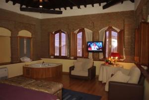 TV a/nebo společenská místnost v ubytování Hotel Palacio de Oñate