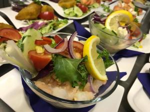 a salad in a glass bowl on a table at Waterfront Hotel in Deal